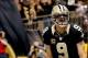 Dec 29, 2013; New Orleans, LA, USA; New Orleans Saints quarterback Drew Brees (9) celebrates a touchdown run against the Tampa Bay Buccaneers during the fourth quarter of a game at the Mercedes-Benz Superdome.The Saints defeated the Buccaneers 42-17. Mand