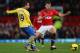 MANCHESTER, ENGLAND - NOVEMBER 10: Michael Carrick of Manchester United competes with Santi Czorla of Arsenal during the Barclays Premier League match between Manchester United and Arsenal at Old Trafford on November 10, 2013 in Manchester, England. (Ph