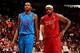 MIAMI, FL - DECEMBER 25: Kevin Durant #35 of the Oklahoma City Thunder and LeBron James #6 of the Miami Heat wait to resume play during a Christmas Day game on December 25, 2012 at American Airlines Arena in Miami, Florida. NOTE TO USER: User expressly ac