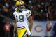 CHICAGO, IL - DECEMBER 29: Randall Cobb #18 of the Green Bay Packers reacts after catching the game winning catch during the fourth quarter against the Chicago Bears defends him on December 29, 2013 at Soldier Field in Chicago, Illinois. The Green Bay Pac