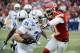 Dec 22, 2013; Kansas City, MO, USA; Indianapolis Colts running back Donald Brown (31) escapes the tackle of Kansas City Chiefs cornerback Dunta Robinson (21) on a touchdown run in the second half at Arrowhead Stadium. Indianapolis won the game 23-7. Manda