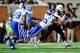 WINSTON SALEM, NC - NOVEMBER 23: Justin Foxx #92 of the Duke Blue Devils sacks Tanner Price #10 of the Wake Forest Demon Deacons during play at BB&T Field on November 23, 2013 in Winston Salem, North Carolina. (Photo by Grant Halverson/Getty Images)