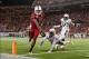 Dec 28, 2013; Orlando, FL, USA; Louisville Cardinals quarterback Teddy Bridgewater (5) rushes into the end zone for a touchdown during the second half of the Russell Athletic Bowl against the Miami Hurricanes at Florida Citrus Bowl Stadium. Mandatory Cred