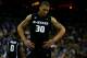 OMAHA, NE - MARCH 22: Michael Beasley #30 of the Kansas State Wildcats stands on court with his head down against the Wisconsin Badgers during the Midwest Region second round of the 2008 NCAA Men's Basketball Tournament on March 22, 2008 at the Qwest Cen