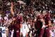 STARKVILLE, MS - NOVEMBER 28: Dak Prescott #15 of the Mississippi State Bulldogs celebrates a touchdown in overtime against the Ole Miss Rebels during a game at Davis Wade Stadium on November 28, 2013 in Starkville, Mississippi. Mississippi State won th