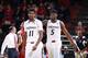 CINCINNATI, OH - DECEMBER 28: Justin Jackson #5 and Jermaine Lawrence #11 of the Cincinnati Bearcats celebrate against the Nebraska Cornhuskers during the game at Fifth Third Arena on December 28, 2013 in Cincinnati, Ohio. Cincinnati won 74-59. (Photo by