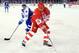 DETROIT, MI - DECEMBER 31: Steve Yzerman #19 of the Detroit Red Wings Alumni controls the puck in front of Bryan McCabe #24 of the Toronto Maple Leafs during the 2014 Bridgestone NHL Winter Classic Ð Alumni Game Two played outdoors during the Hockeytown W