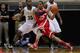 WEST LAFAYETTE, IN - DECEMBER 31: Lenzelle Smith Jr. #32 of the Ohio State Buckeyes dribbles the ball in the back court against Rapheal Davis #35 of the Purdue Boilermakers at Mackey Arena on December 31, 2013 in West Lafayette, Indiana. Ohio State defeat