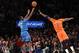 Dec 25, 2013; New York, NY, USA; Oklahoma City Thunder point guard Reggie Jackson (15) shoots over New York Knicks power forward Amar'e Stoudemire (1) during the fourth quarter of a game at Madison Square Garden. The Thunder defeated the Knicks 123-94. Ma