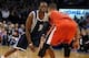 Dec 31, 2013; Oklahoma City, OK, USA; Oklahoma City Thunder point guard Reggie Jackson (15) handles the ball while being defended by Portland Trail Blazers point guard Damian Lillard (0) during the fourth quarter at Chesapeake Energy Arena. Mandatory Cred