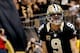 Dec 29, 2013; New Orleans, LA, USA; New Orleans Saints quarterback Drew Brees (9) celebrates a touchdown run against the Tampa Bay Buccaneers during the fourth quarter of a game at the Mercedes-Benz Superdome.The Saints defeated the Buccaneers 42-17. Mand