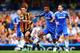 LONDON, ENGLAND - AUGUST 18: Robert Koren of Hull City is challenged by Ashley Cole of Chelsea during the Barclays Premier League match between Chelsea and Hull City at Stamford Bridge on August 18, 2013 in London, England. (Photo by Clive Mason/Getty I
