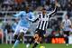 NEWCASTLE UPON TYNE, ENGLAND - DECEMBER 15: Yaya Toure of Manchester City battles with James Perch of Newcastle United during the Barclays Premier League match between Newcastle United and Manchester City at St James' Park on December 15, 2012 in Newcastl