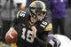 IOWA CITY, IOWA - OCTOBER 26: Quarterback Jake Rudock #15 of the Iowa Hawkeyes scrambles on a keeper during the second quarter in front of defensive lineman Chance Carter #99 of the Northwestern Wildcats on October 26, 2013 at Kinnick Stadium in Iowa Cit