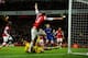 LONDON, ENGLAND - JANUARY 01: Nicklas Bendtner of Arsenal turns away in celebration as he scores their first goal past goalkeeper David Marshall of Cardiff City (grounded) during the Barclays Premier League match between Arsenal and Cardiff City at Emira