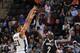SAN ANTONIO, TX - December 31: Tim Duncan #21 of the San Antonio Spurs attempts a shot against Kevin Garnett #2 of the Brooklyn Nets at the AT&T Center on December 31, 2013 in San Antonio, Texas. NOTE TO USER: User expressly acknowledges and agrees that,