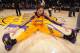 LOS ANGELES, CA - DECEMBER 31: Pau Gasol #16 of the Los Angeles Lakers stretches before a game against the Milwaukee Bucks at STAPLES Center on December 31, 2013 in Los Angeles, California. NOTE TO USER: User expressly acknowledges and agrees that, by dow