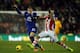 STOKE ON TRENT, ENGLAND - JANUARY 01: Wilson Palacios of Stoke City in action with Ross Barkley of Everton during the Barclays Premier League match between Stoke City and Everton at Britannia Stadium on January 01, 2014 in Stoke on Trent, England. (Photo