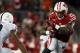 Nov 30, 2013; Madison, WI, USA; Wisconsin Badgers running back Melvin Gordon (25) rushes for yardage as Penn State Nittany Lions cornerback Trevor Williams (10) defends at Camp Randall Stadium. Penn State defeated Wisconsin 31-24. Mandatory Credit: Mary