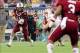 Jan 1, 2014; Orlando, FL, USA; South Carolina Gamecocks quarterback Connor Shaw (14) runs the ball in the first quarter as the South Carolina Gamecocks face the Wisconsin Badgers in the Capital One Bowl at Florida Citrus Bowl. Mandatory Credit: David Mann