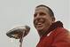 Jan 1, 2014; Jacksonville, FL, USA; Nebraska Cornhuskers head coach Bo Pelini smiles as he receives the Gator Bowl trophy after their game against the Georgia Bulldogs at EverBank Field. The Nebraska Cornhuskers beat the Georgia Bulldogs 24-19. Mandatory