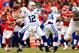 KANSAS CITY, MO - DECEMBER 22: Quarterback Andrew Luck #12 of the Indianapolis Colts passes during the game against the Kansas City Chiefs at Arrowhead Stadium on December 22, 2013 in Kansas City, Missouri. (Photo by Jamie Squire/Getty Images)