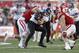 MADISON, WI - OCTOBER 12: Mike Jensen #80 of the Northwestern Wildcats makes the catch before getting tackled by Tanner McEvoy #17 of the Wisconsin Badgers during the second half of play at Camp Randall Stadium on October 12, 2013 in Madison, Wisconsin. (