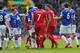 LIVERPOOL, ENGLAND - NOVEMBER 23: The Everton players react to Steven Gerrard of Liverpool following a challenge on Gareth Barry of Everton during the Barclays Premier League match between Everton and Liverpool at Goodison Park on November 23, 2013 in Li