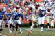 GAINESVILLE, FL - NOVEMBER 30: Kelvin Benjamin #1 of the Florida State Seminoles runs for yardage during the game against the Florida Gators on November 30, 2013 in Gainesville, Florida. (Photo by Sam Greenwood/Getty Images)
