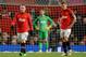 MANCHESTER, ENGLAND - JANUARY 01: Wayne Rooney of Manchester United and his team-mate Nemanja Vidic (r) react after conceding a second goal during the Barclays Premier League match between Manchester United and Tottenham Hotspur at Old Trafford on Januar