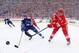 ANN ARBOR, MI - JANUARY 01: Brendan Smith #2 of the Detroit Red Wings fires the puck while Nazem Kadri #43 of the Toronto Maple Leafs closes in during the first period of the 2014 Bridgestone NHL Winter Classic at Michigan Stadium on January 1, 2014 in An