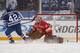 ANN ARBOR, MI - JANUARY 01: Tyler Bozak #42 of the Toronto Maple Leafs scores the game winning goal in a shootout past Jimmy Howard #35 of the Detroit Red Wings during the 2014 Bridgestone NHL Winter Classic at Michigan Stadium on January 1, 2014 in Ann A
