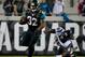 JACKSONVILLE, FL - DECEMBER 05: Maurice Jones-Drew #32 of the Jacksonville Jaguars runs past D.J. Swearinger #36 of the Houston Texans during the game at EverBank Field on December 5, 2013 in Jacksonville, Florida. (Photo by Sam Greenwood/Getty Images)