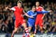 LONDON, ENGLAND - DECEMBER 01: Luke Shaw of Southampton battles with Fernando Torres of Chelsea during the Barclays Premier League match between Chelsea and Southampton at Stamford Bridge on December 1, 2013 in London, England. (Photo by Ian Walton/Gett