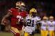 Notice how 49ers quarterback Colin Kaepernick is able to look at Green Bay's defenders way off in the distance.