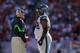 DENVER - SEPTEMBER 19: Defensive line coach Dan Quinn talks with defensive tackle Brandon Mebane #92 of the Seattle Seahawks as they face the Denver Broncos at INVESCO Field at Mile High on September 19, 2010 in Denver, Colorado The Broncos defeated the