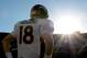 December 29, 2013; Oakland, CA, USA; Denver Broncos quarterback Peyton Manning (18) watches from the sideline during the third quarter against the Oakland Raiders at O.co Coliseum. The Broncos defeated the Raiders 34-14. Mandatory Credit: Kyle Terada-USA