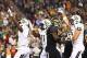 Jan 1, 2014; Glendale, AZ, USA; Central Florida Knights running back Storm Johnson (left) celebrates with teammates after scoring a touchdown in the first quarter against the Baylor Bears during the Fiesta Bowl at University of Phoenix Stadium. Mandatory