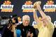 GLENDALE, AZ - JANUARY 01: Head coach George O'Leary of the UCF Knights holds up the trophy on stage after defeating the Baylor Bears 52-42 in the Tostitos Fiesta Bowl at University of Phoenix Stadium on January 1, 2014 in Glendale, Arizona. (Photo by J