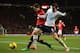 MANCHESTER, ENGLAND - JANUARY 01: Adnan Januzaj of Manchester United battles for the ball with Vlad Chiriches of Tottenham Hotspur during the Barclays Premier League match between Manchester United and Tottenham Hotspur at Old Trafford on January 1, 2014