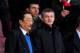 LONDON, ENGLAND - JANUARY 01: Molde manager Ole Gunnar Solskjaer (2L) and Cardiff City owner Vincent Tan (L) look on from the stands prior to the Barclays Premier League match between Arsenal and Cardiff City at Emirates Stadium on January 1, 2014 in Lon