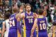 Mar 27, 2013; Minneapolis, MN, USA; Los Angeles Lakers power forward Pau Gasol (16) congratulates teammates Kobe Bryant (24) and Steve Nash (10) at the end of the fourth quarter at Target Center. Lakers won 120-117. Mandatory Credit: Greg Smith-USA TODAY