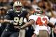 Dec 29, 2013; New Orleans, LA, USA; New Orleans Saints defensive end Cameron Jordan (94) rushes against Tampa Bay Buccaneers running back Bobby Rainey (43) during the first half of a game at the Mercedes-Benz Superdome. Mandatory Credit: Derick E. Hingle-