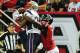 ATLANTA, GA - SEPTEMBER 29: Aqib Talib #31 of the New England Patriots intercepts pass against Julio Jones #11 of the Atlanta Falcons at the Georgia Dome on September 29, 2013 in Atlanta, Georgia. (Photo by Scott Cunningham/Getty Images)