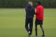 LONDON, ENGLAND - MAY 04: Emmanuel Adebayor talks to Arsene Wenger during Arsenal's training session prior to Tuesday's Champions League fixture against Manchester United at London Colney training ground on May 04, 2009 in London, England. (Photo by Tom