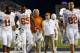 FORT WORTH, TX - OCTOBER 26: Head coach Mack Brown of the Texas Longhorns walks off the field with his team after play was suspended against the TCU Horned Frogs due to lightning in the area in the second quarter at Amon G. Carter Stadium on October 26,