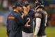 CHICAGO, IL - OCTOBER 10: Head coach Marc Trestman of the Chicago Bears talks with Josh McCown #12 and Jay Cutler #6 during a game against the New York Giants at Soldier Field on October 10, 2013 in Chicago, Illinois. The Bears defeated the Giants 27-21.