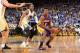 OAKLAND, CA - OCTOBER 30: Nick Young #0 of the Los Angeles Lakers handles the ball while being pursued by Andre Iguodala #9 of the Golden State Warriors at Oracle Arena on October 30, 2013 at in Oakland, California. NOTE TO USER: User expressly acknowledg