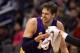 PHOENIX, AZ - DECEMBER 23: Pau Gasol #16 of the Los Angeles Lakers reacts after being cut near his right eye during the second half of the NBA game against the Phoenix Suns at US Airways Center on December 23, 2013 in Phoenix, Arizona. The Suns defeated