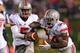 EVANSTON, IL - OCTOBER 05: Braxton Miller #5 of the Ohio State Buckeyes hands off to Carlos Hyde #34 against the Northwestern Wildcats at Ryan Field on October 5, 2013 in Evanston, Illinois. Ohio State defeated Northwestern 40-30. Photo by Jonathan Daniel